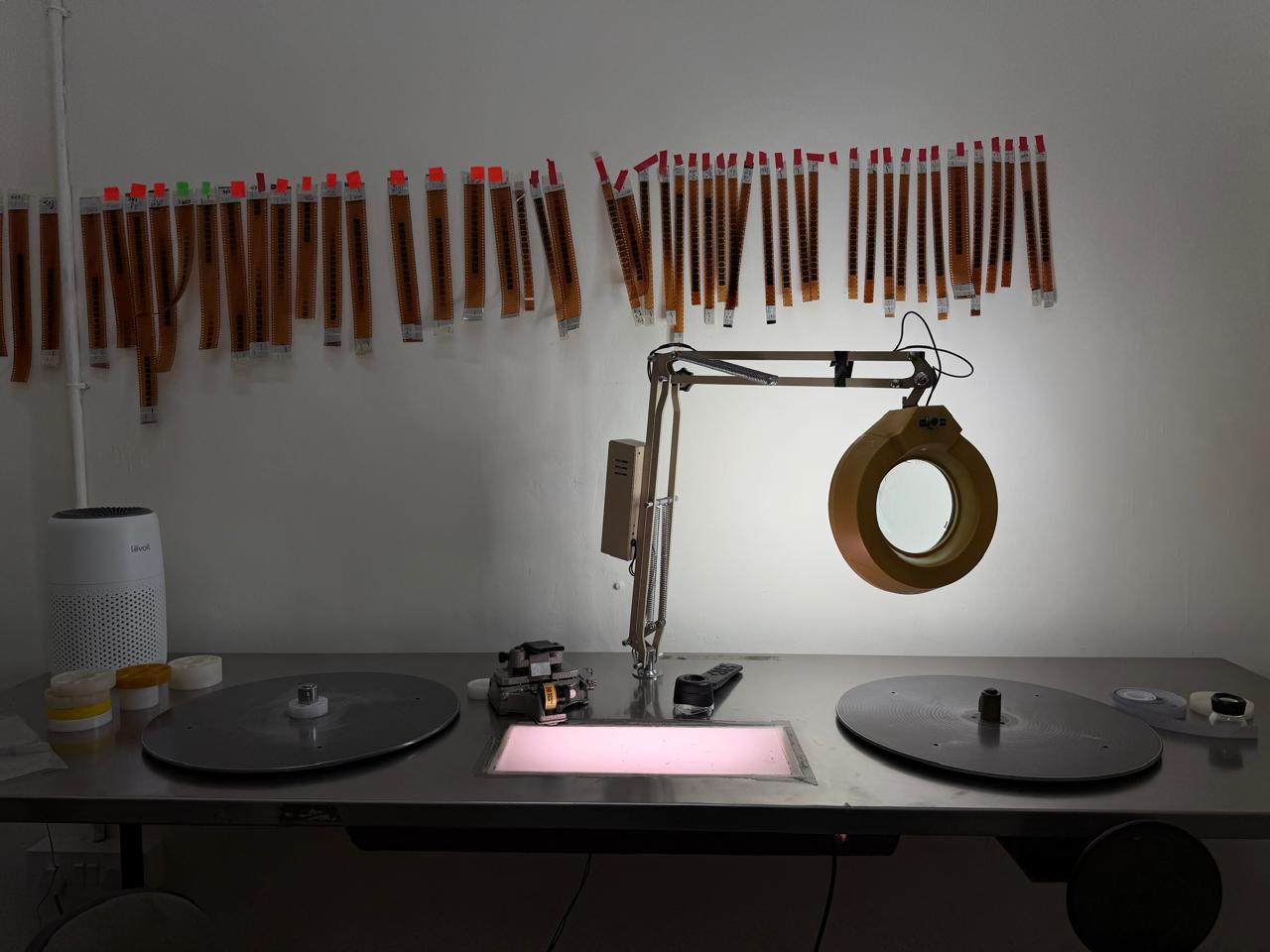 Film inspection workspace at Monsoon Colour Lab